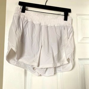Lululemon track that mid-rise lined short in white.